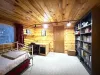 Second bedroom with desk and shelves with books and games to enjoy.