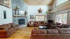 Sofas and fireplace in the living area. Perfect for relaxing after a long day outdoors.