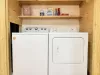 Full size washer and dryer with laundry soap provided.