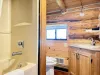 Bathroom upstairs with beautiful vanity and storage beneath for your items.