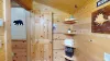Open bathroom with plenty of space and storage.