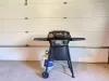Propane grill in the garage