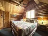 Bedroom #3 located upstairs with a Full and Twin bed.