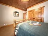 Master bedroom on the main floor with a Queen bed.
