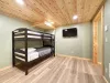 Bedroom off the king room in the basement with a bunk bed, perfect for 2 kiddos.