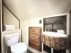 Toilet area of the bathroom.