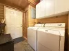 Full size washer and dryer with laundry soap provided.