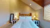 Queen size bed located in this room.