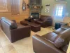 Relaxing leather furniture in great room.