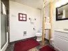 3/4 bathroom with standing shower, toilet, and sink.