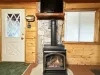 Basement living room area gas fireplace and TV
