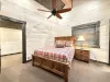 Upstairs private bedroom with queen bed.