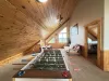 Full size futon for additional beds.