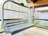 Sit on the porch on this vintage ski lift swing.
