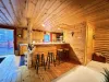 Kitchen and dining room area. 4 bar stools for more seating.