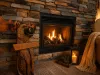 Cozy up next to the beautiful stone fireplace, complete with a charming carved wooden moose welcome statue and a warm, inviting hearth.
