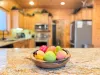 Every detail is designed for comfort. The expansive granite kitchen island offers plenty of open prep space to prepare fresh ingredients for your group.