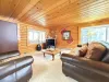 Living room with seating and smart tv.
