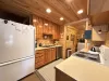 Large Galley Kitchen. Large fridge and dishwasher.