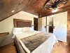 The master bedroom is equipped with a queen bed and ensuite bathroom.