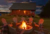 Enjoy the beautiful landscape around the cabin as you enjoy the firepit.