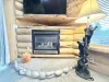 Living room fireplace to enjoy during the cold months.