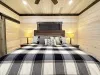 Inviting Master king bed waiting for you to cozy up and have the best night sleep.