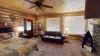 Located near the kitchen is the master bedroom with lots of open space to relax during your stay.