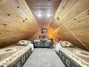 Upper Loft with 2 twin beds and a Queen.