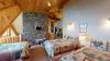 East wing loft is equipped with 3 Queen size bed.