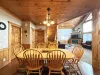 2nd Dining table seats 6 people with additional seating at the kitchen island.
