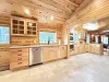 Full kitchen with appliances, cookware, dishes, silverware, and basic cooking spices.