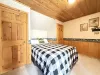 Queen size bed located in the garage apartment.