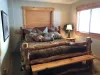 Basement Master bedroom with a King size bed.