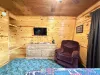 First Bedroom with queen bed and comfortable recliner for some needed relaxation.