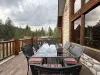 Enjoy the beautiful weather from the deck of the cabin.