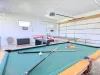 Keep the fun going in the fully equipped game room! Enjoy a match of pool or ping pong, perfect for rainy days or fun nights.