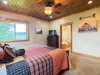 The master suite offer seamless access to its own private, ensuite bathroom, ensuring ultimate comfort and privacy during your stay.