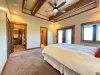 Mater bedroom with walk in closet and private bathroom.
