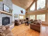 Open great room next to the kitchen and dining area.