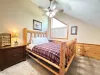 Lots of natural light in this room and a ceiling fan for those summer nights.