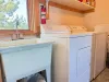 Laundry room located upstairs by the open bedroom.