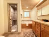 Master ensuite bathroom with large walk in shower and jetted tub.