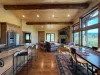 Seating available at the kitchen island as well as the dining table.