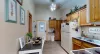 The kitchen has full amenities, dishes, basic cookware and spices for you to use.