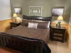 Master bedroom with new king bed and comfortable mattress.