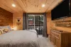 The main level bedroom has a small private porch.