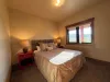 2nd bedroom with a Queen size bed.