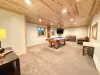 Basement Living area with a Pool Table.