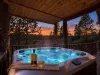 Relax in the hot tub and watch the sun set.